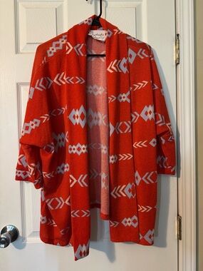 Fantastic Fawn Orange and White Geometric Open-Front Cardigan